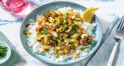 Recipe Pan-seared shrimp with chili and cumin flavored butter, served with zucchini, basmati rice, a